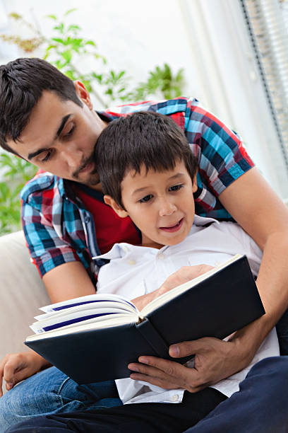 istock Father and son at home 451633415