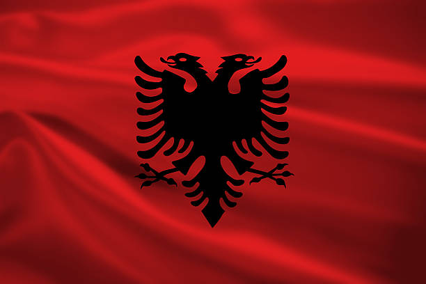istock Albania flag blowing in the wind 451638907