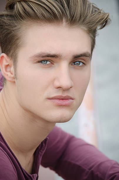 istock Attractive blue eyed, blond young man head-shot 451683409