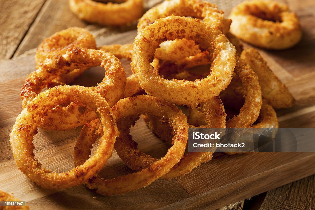 Homemade Crunchy Fried Onion Rings Homemade Crunchy Fried Onion Rings with Ketchup American Culture Stock Photo