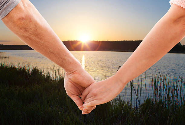 istock Happy couple holding hands 451685733