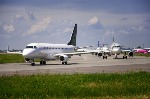 many planes waiting for take-off