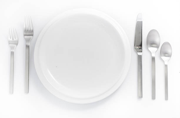 istock cutlery and disheware isolated on a white background 451690579