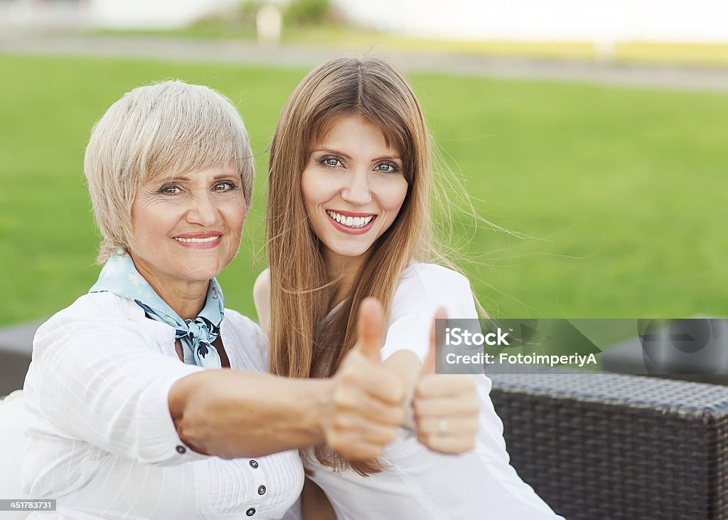 Adult mother and daughter adult mother and daughter showing OK Active Seniors Stock Photo