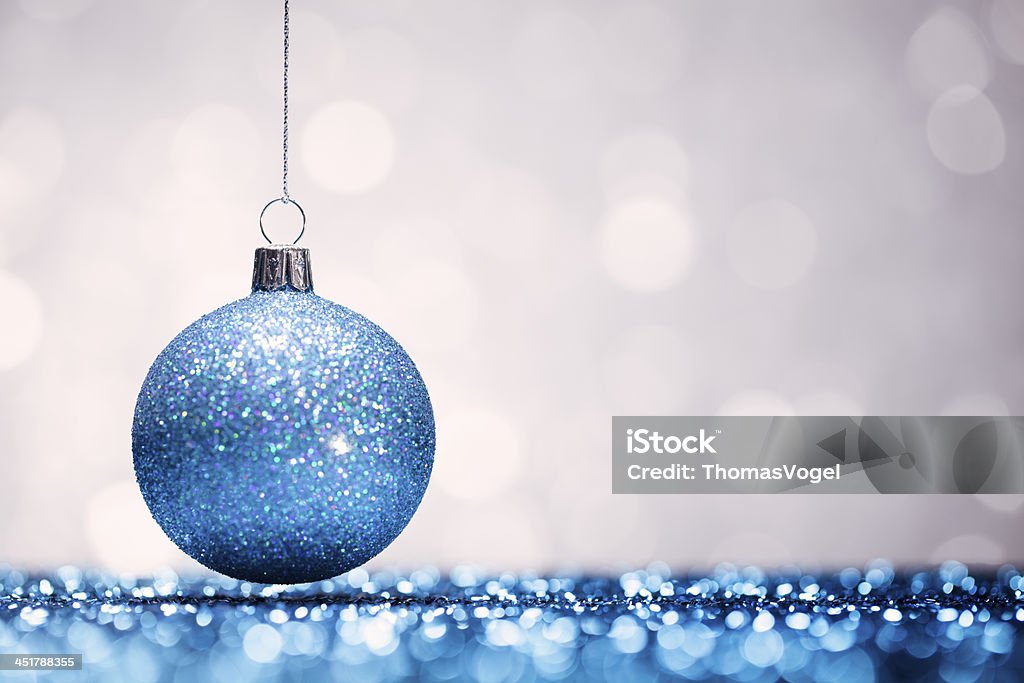 Blue Christmas Bauble - Glitter Bokeh Hanging http://thomasvogel.eu/istock/is_christmas.jpg Blue Stock Photo