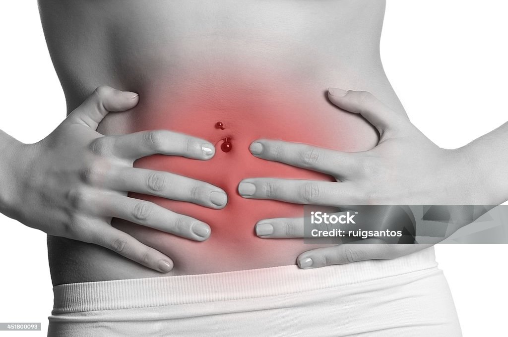 Stomach Ache Woman suffering from stomach pain Abdomen Stock Photo