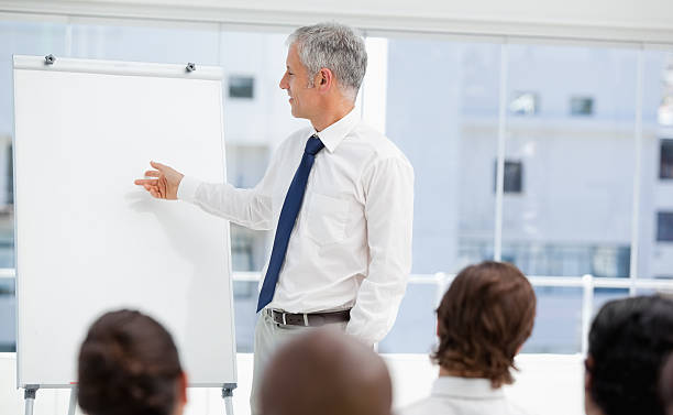 istock Businessman looking at a chart during the meeting 451802035