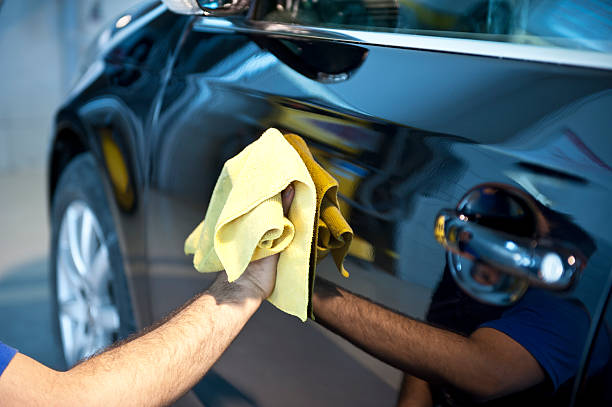 car washing waterless car wash  microfiber stock pictures, royalty-free photos & images