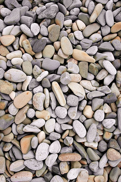 istock Pebbles and Stones, River Rocks Background 451803293
