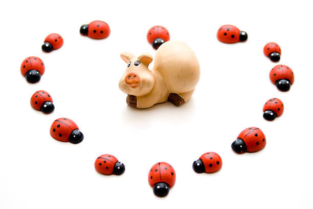 istock Luck pig and ladybug heart 451818997