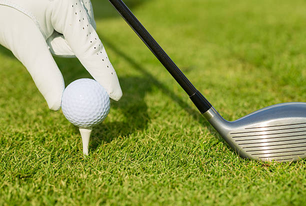 istock Close up view of golf ball on tee 451819431