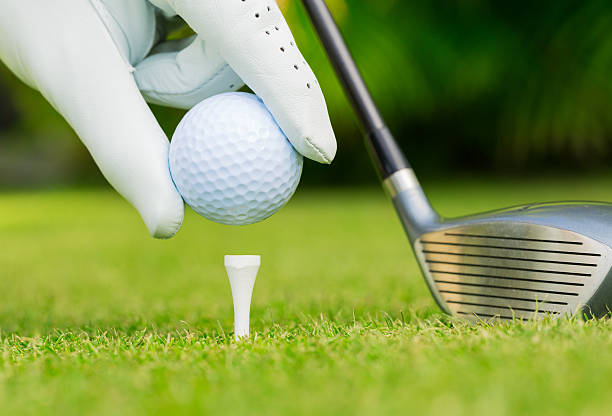 istock Close up view of golf ball on tee 451819435