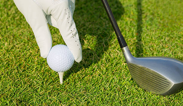istock Close up view of golf ball on tee 451819439
