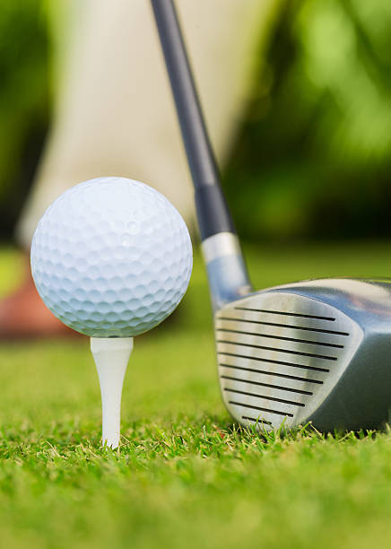 istock Close up view of golf ball on tee 451819459