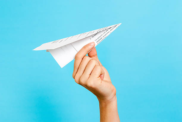 Paper airplane concept stock photo