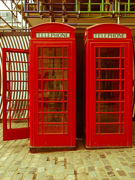 istock Retro looking London telephone box 451823283