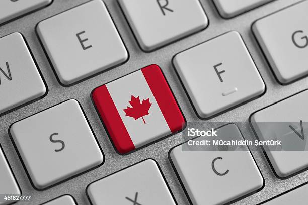 Canada Flag On A Laptop Stock Photo - Download Image Now - Canada, Tax, Canadian Flag