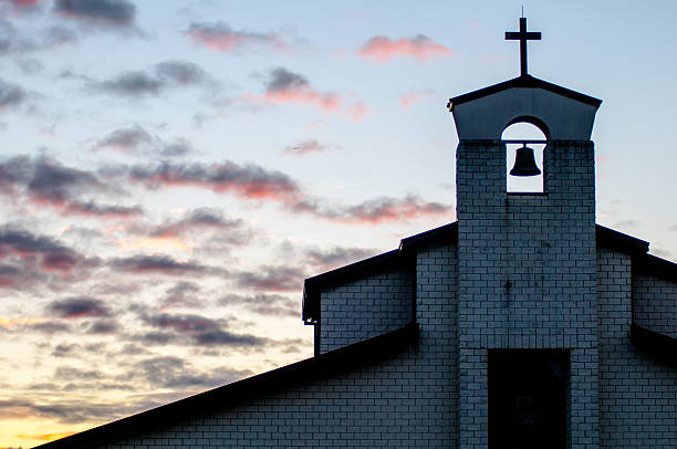 istock Classic church silhouette on tropical sunset 451828295