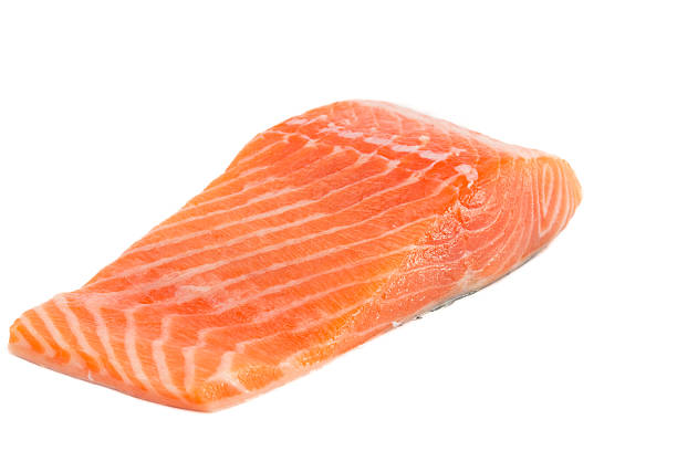 istock Raw salmon fillet isolated on white background 451836901