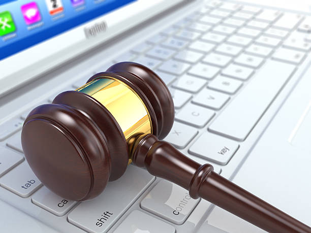 istock Online judgement. Gavel on laptop.  3d 451844283