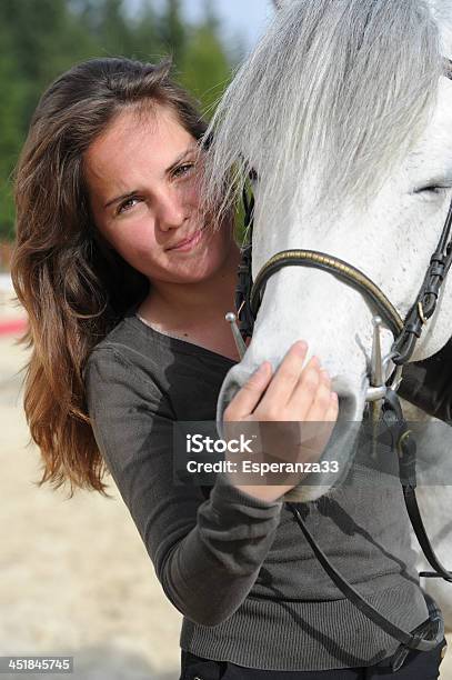Woman Playing With Her Horse Stock Photo - Download Image Now - 25-29 Years, Adult, Adults Only