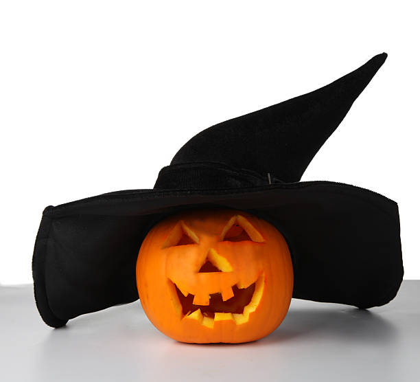 istock Halloween pumpkins in a forest at night 451846345