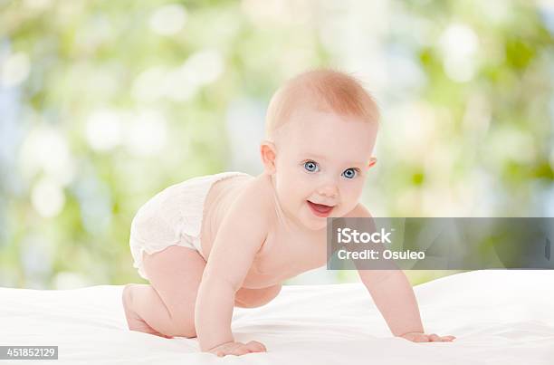 Cute Baby With Beautiful Blue Eyes On The Nature Background Stock Photo - Download Image Now