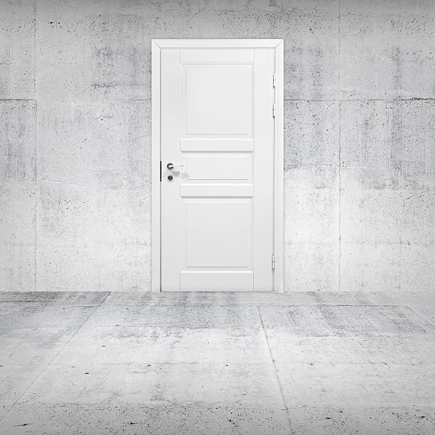 istock Abstract empty white interior with concrete wall and closed door 451852475