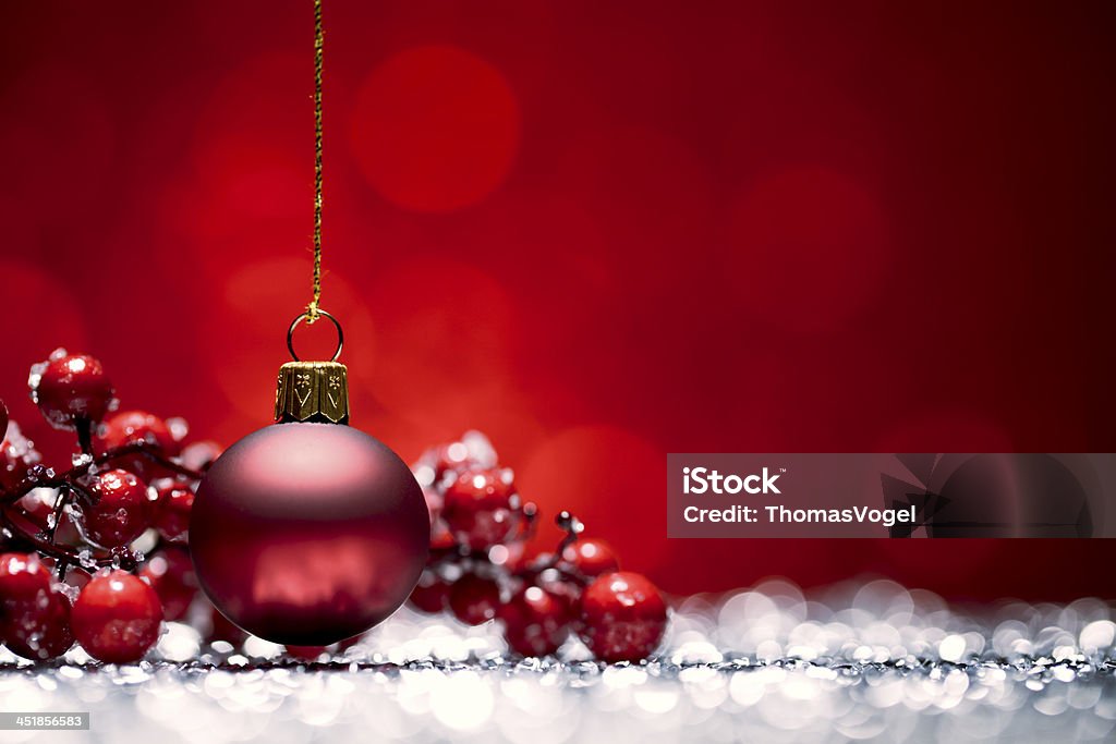 Red Christmas Bauble-Glitter Bokeh Hängen - Lizenzfrei Rot Stock-Foto