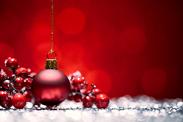 istock Red Christmas Bauble - Glitter Bokeh Hanging 451856583