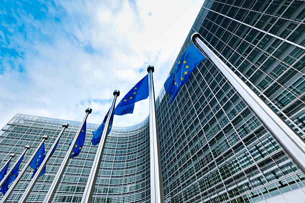European Union blue and gold flags flying in Brussels stock photo