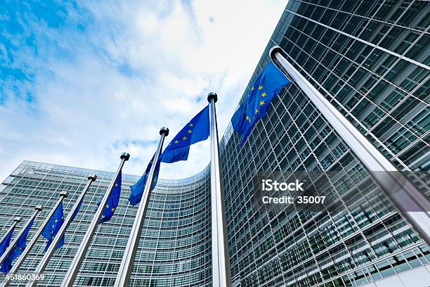 European Union Blue And Gold Flags Flying In Brussels Stock Photo - Download Image Now