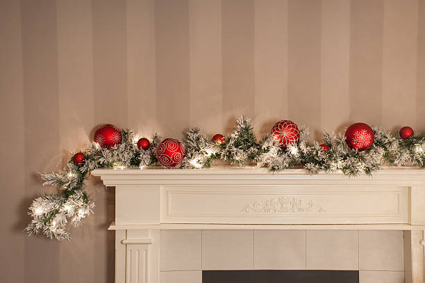 Christmas Garland on Fireplace stock photo