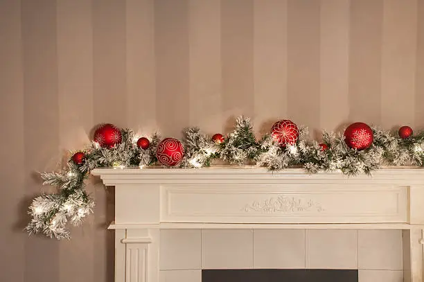 a christmas garland / sitting on a mantlepiece / looking all festive
