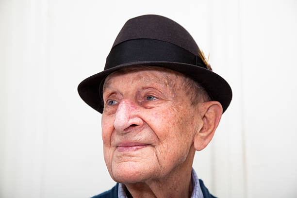 istock Senior man wearing a felt hat 451862789