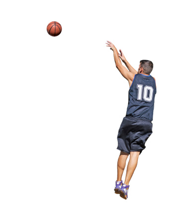 basketball player shooting the ball on white background