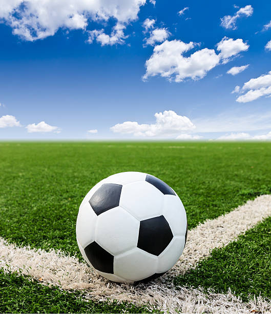 istock football on green grass field conner 451880975