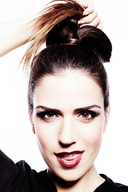 istock Pretty girl playing with ponytail 451884627