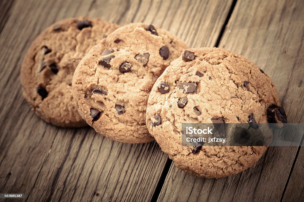 stacked cookies chocolate cookie on wooden table Backgrounds Stock Photo