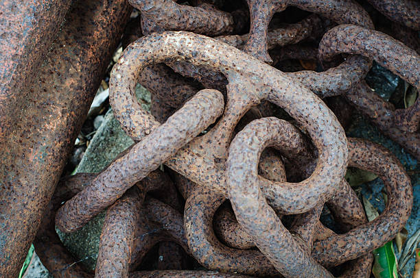 heavy rusting chains to anchor a vessel stock photo