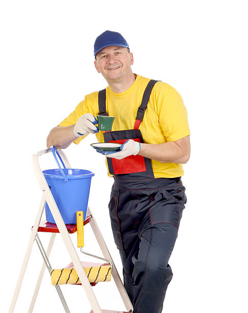 istock Worker on ladder with cup of tea 451893883