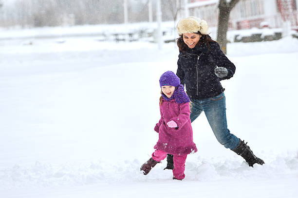 istock Happy family enjoying in winter 451905145