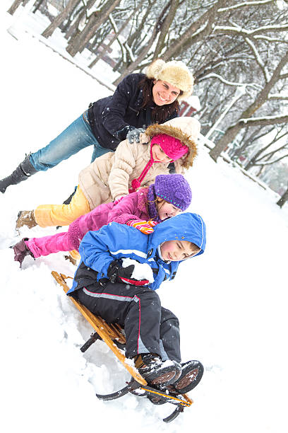 istock Happy family enjoying in winter 451907801