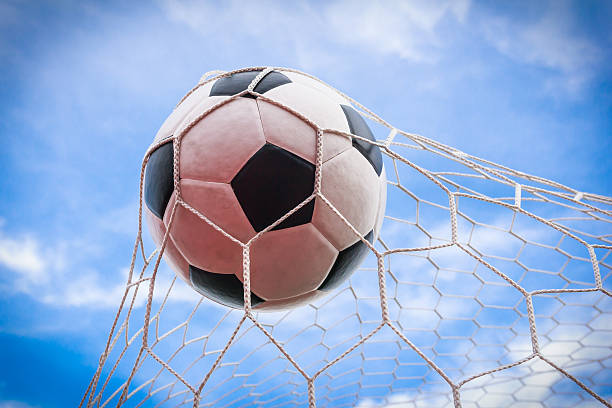 istock football in goal net 451910109