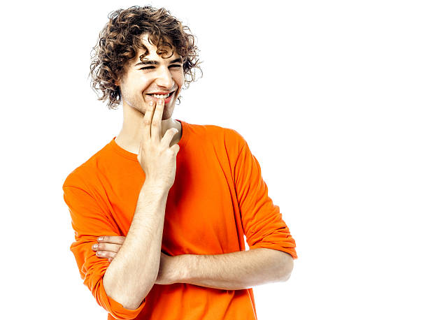 istock young man smiling looking away portrait 451910679