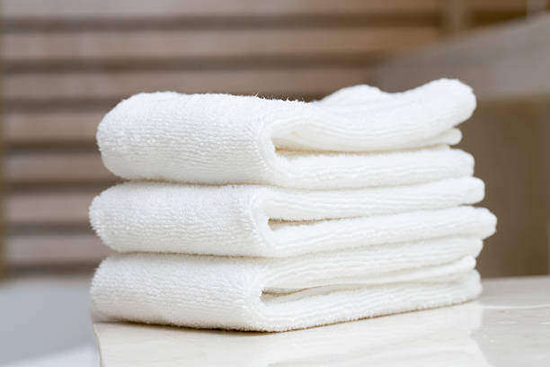 A Stack Of White Spa Towels Folded Stock Photo - Download Image Now -  Washcloth, Towel, White Color - iStock