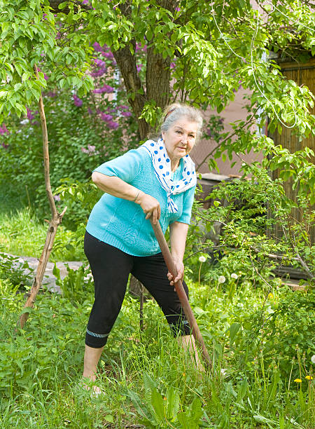 istock Old lady in garden 451911347