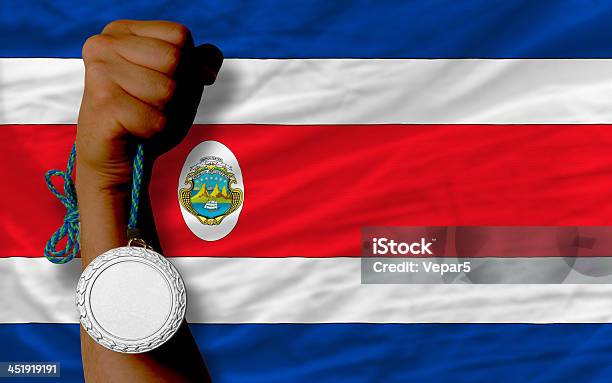 Foto de Medalha De Prata Por Esporte E Bandeira Nacional Da Costa Rica e mais fotos de stock de Bandeira