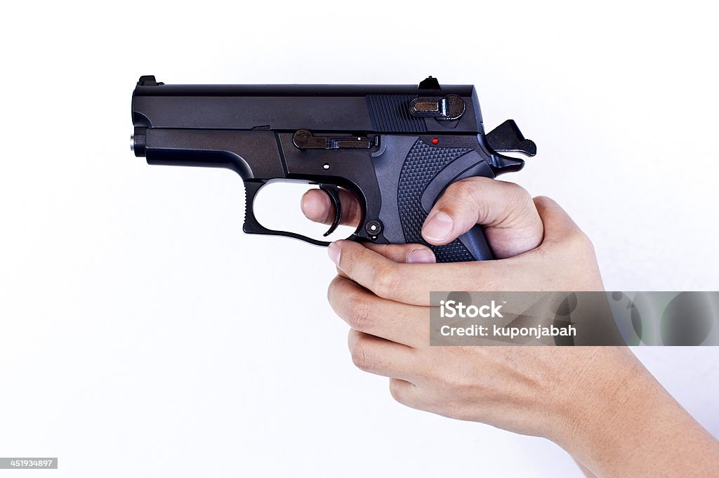 Gun In Woman Hand Gun In Woman Hand On White Backgrounds Adult Stock Photo
