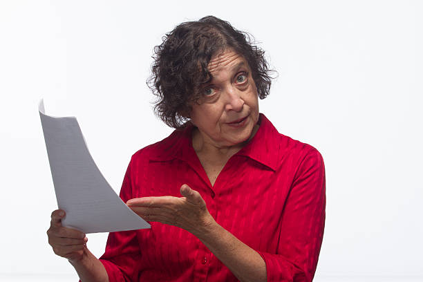 istock Impatient woman gesturing at report, horizontal 451935771